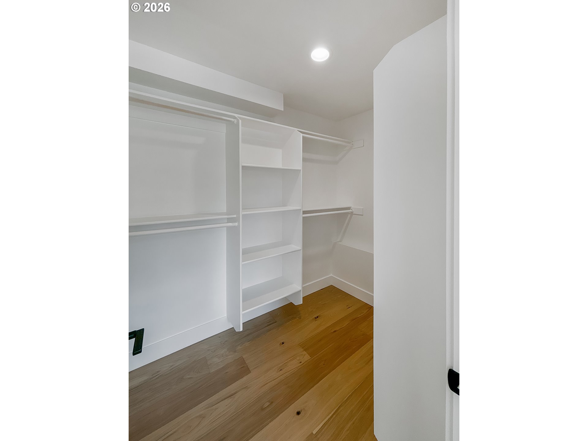 466 Meadows Drive Nehalem, OR 97131 - Photo 23 of 28 a view of a room with wooden floor