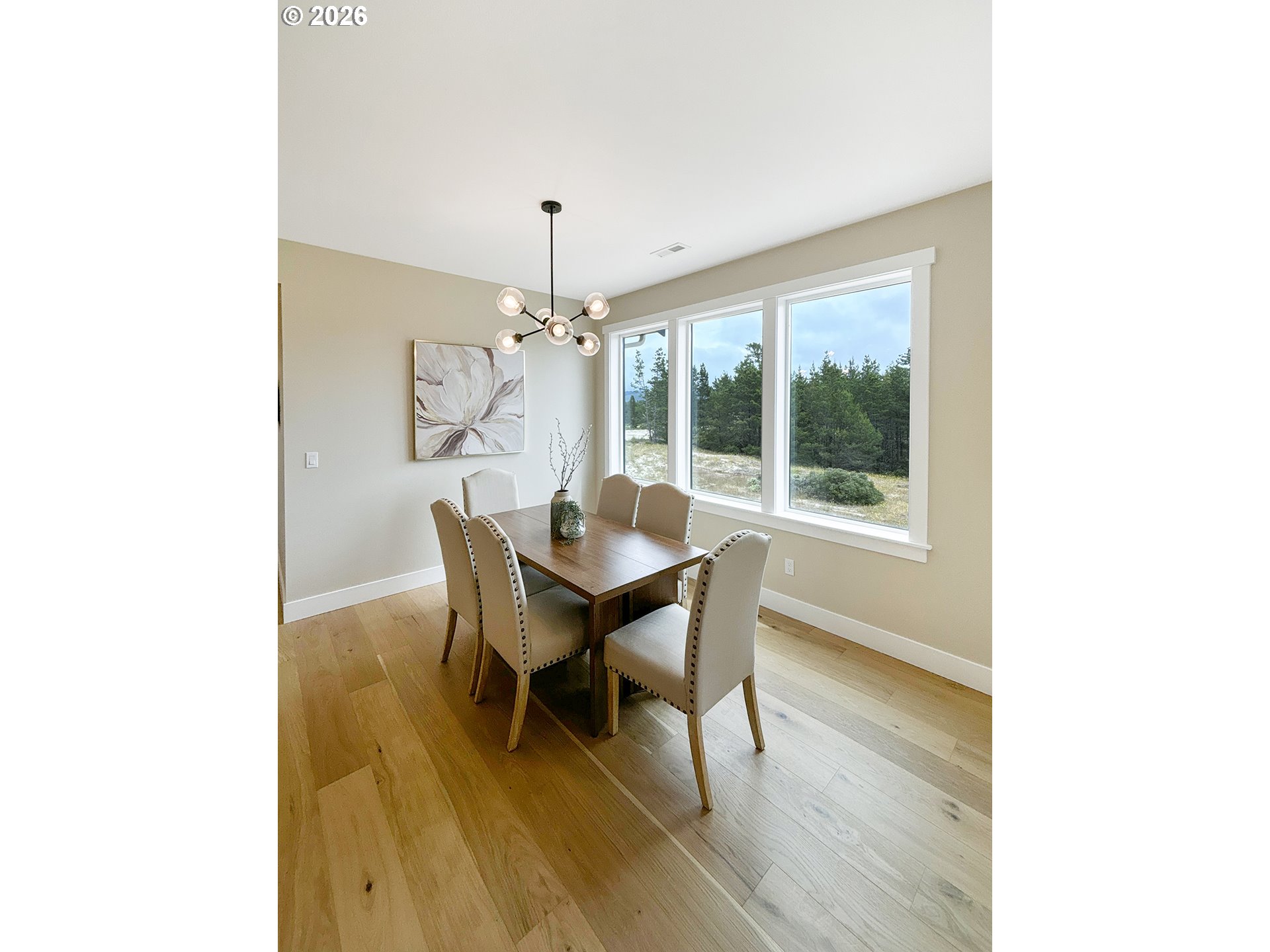 466 Meadows Drive Nehalem, OR 97131 - Photo 10 of 28 a dining room with furniture and window