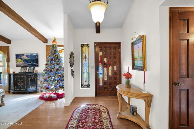 a bedroom with furniture and a window