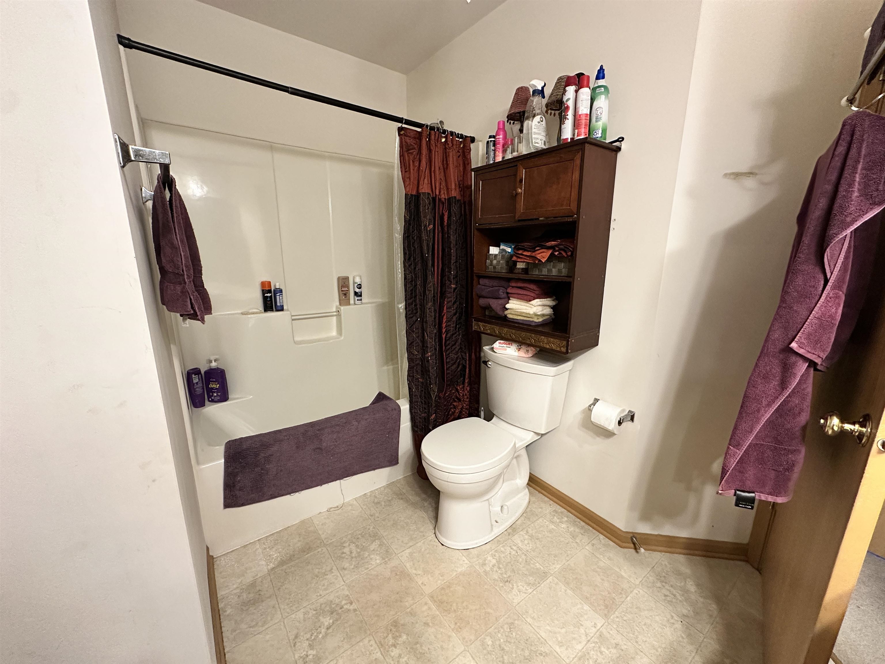 47 D Rolling Oaks Road Sugar Grove, IL 60554 - Photo 16 of 23 a bathroom with a toilet and a shower