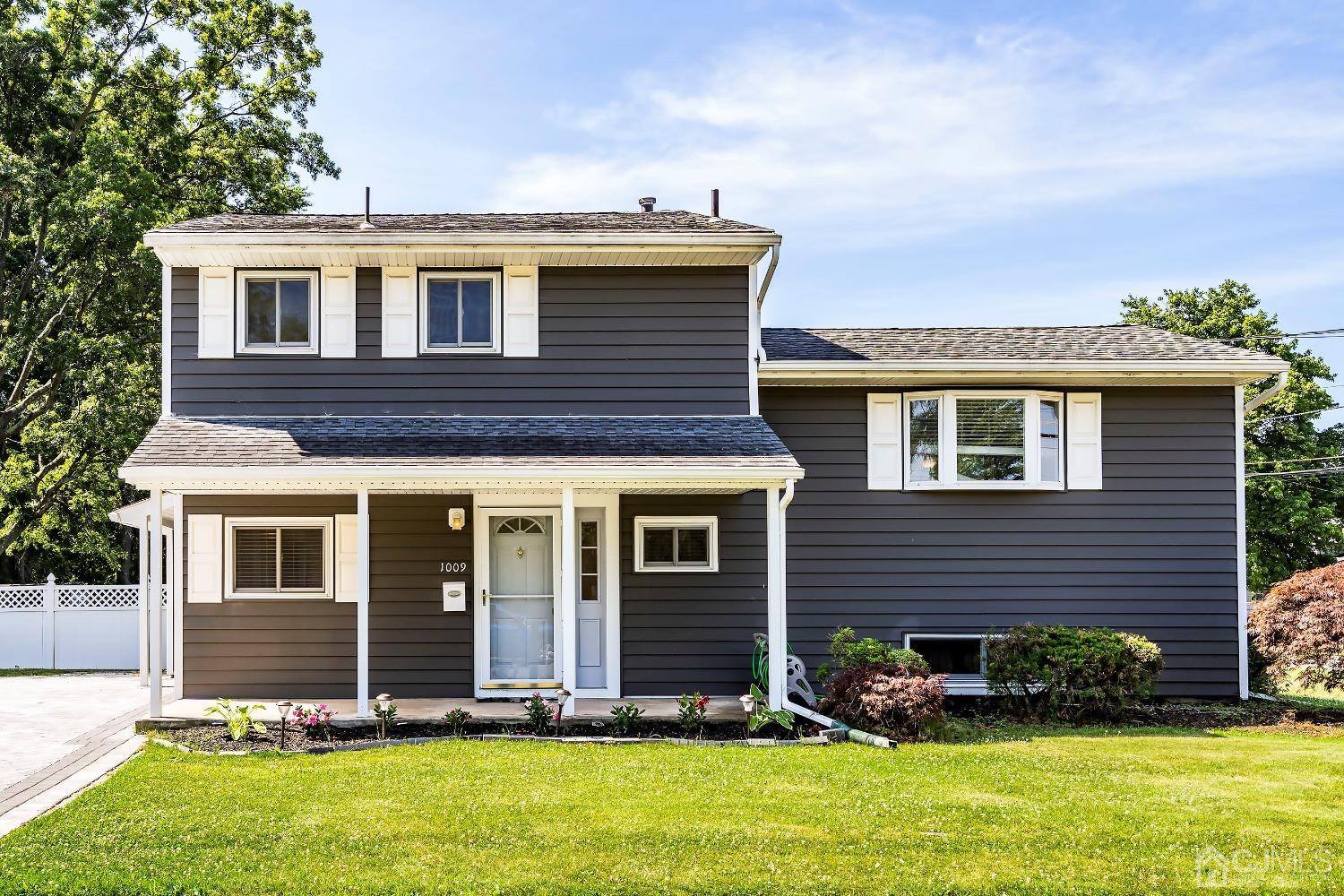 1009 Helene Place Raritan, NJ 08869 - Photo 1 of 25 a view of a house with a yard