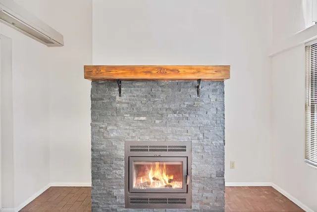 a close view of fireplace in kitchen
