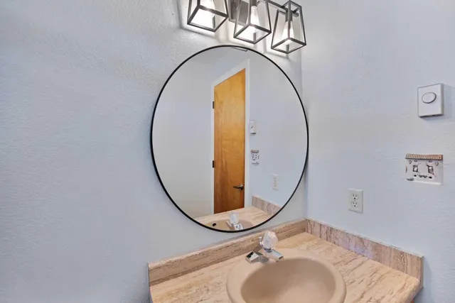 a bathroom with a shower and a toilet