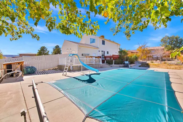 a view of a playground with a patio