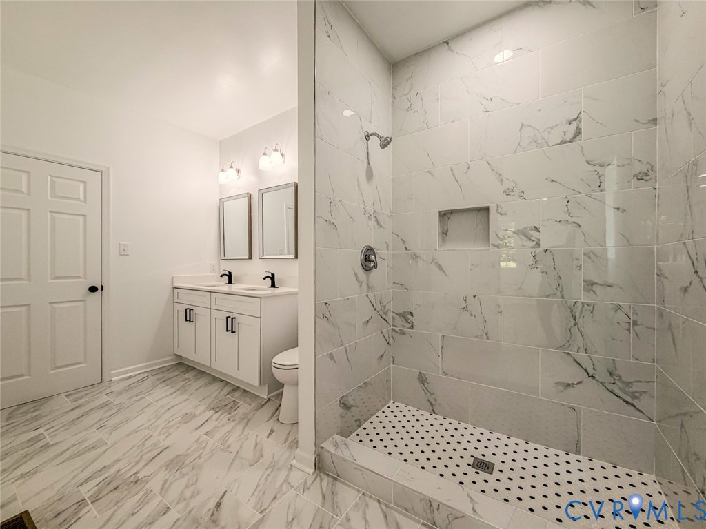 19614 Manson Church Road McKenney, VA 23872 - Photo 3 of 24 a bathroom with a sink a toilet and shower