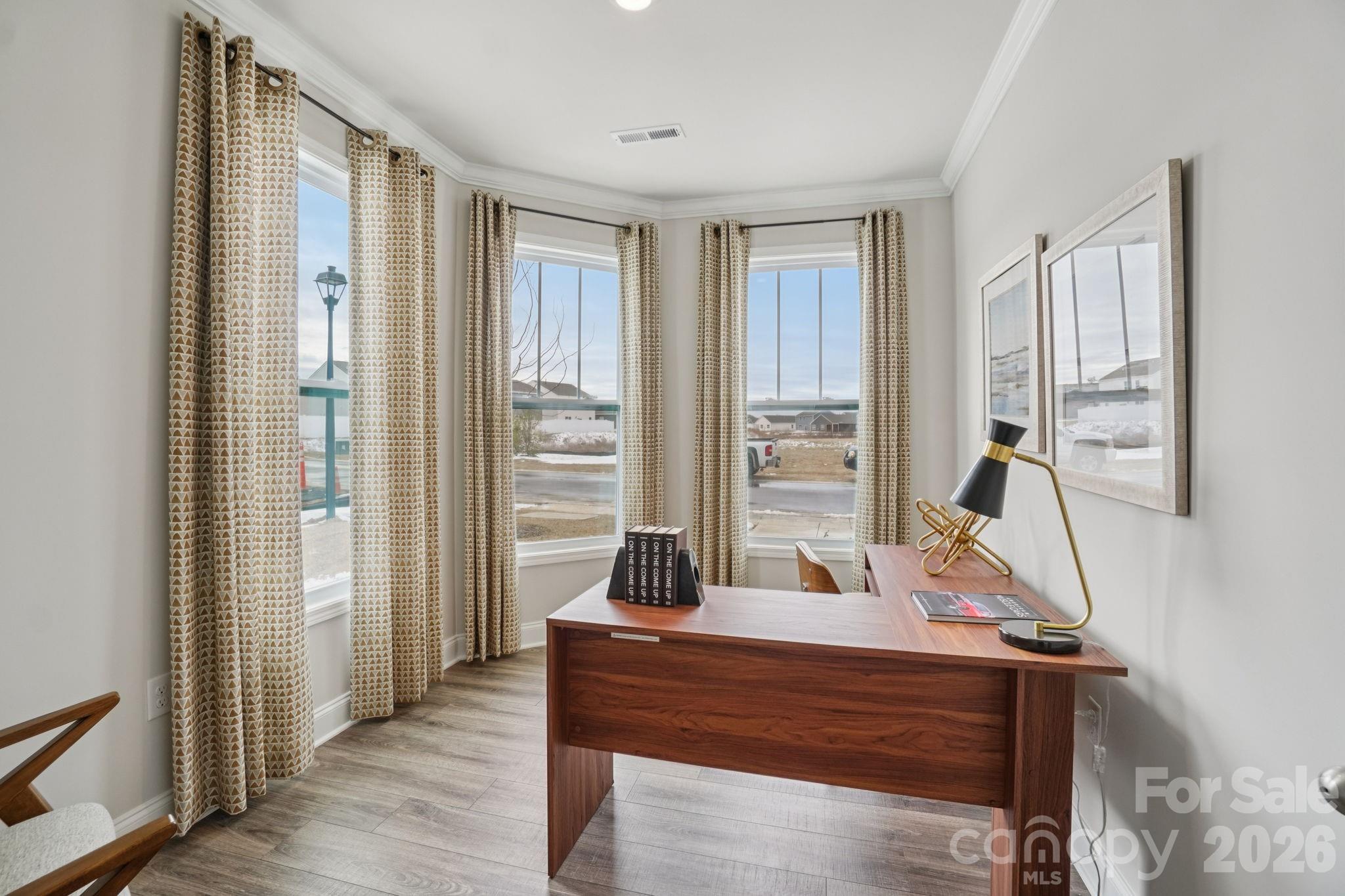 362 Lagoon Road Fletcher, NC 28732 - Photo 15 of 34 a room with wooden floor and windows