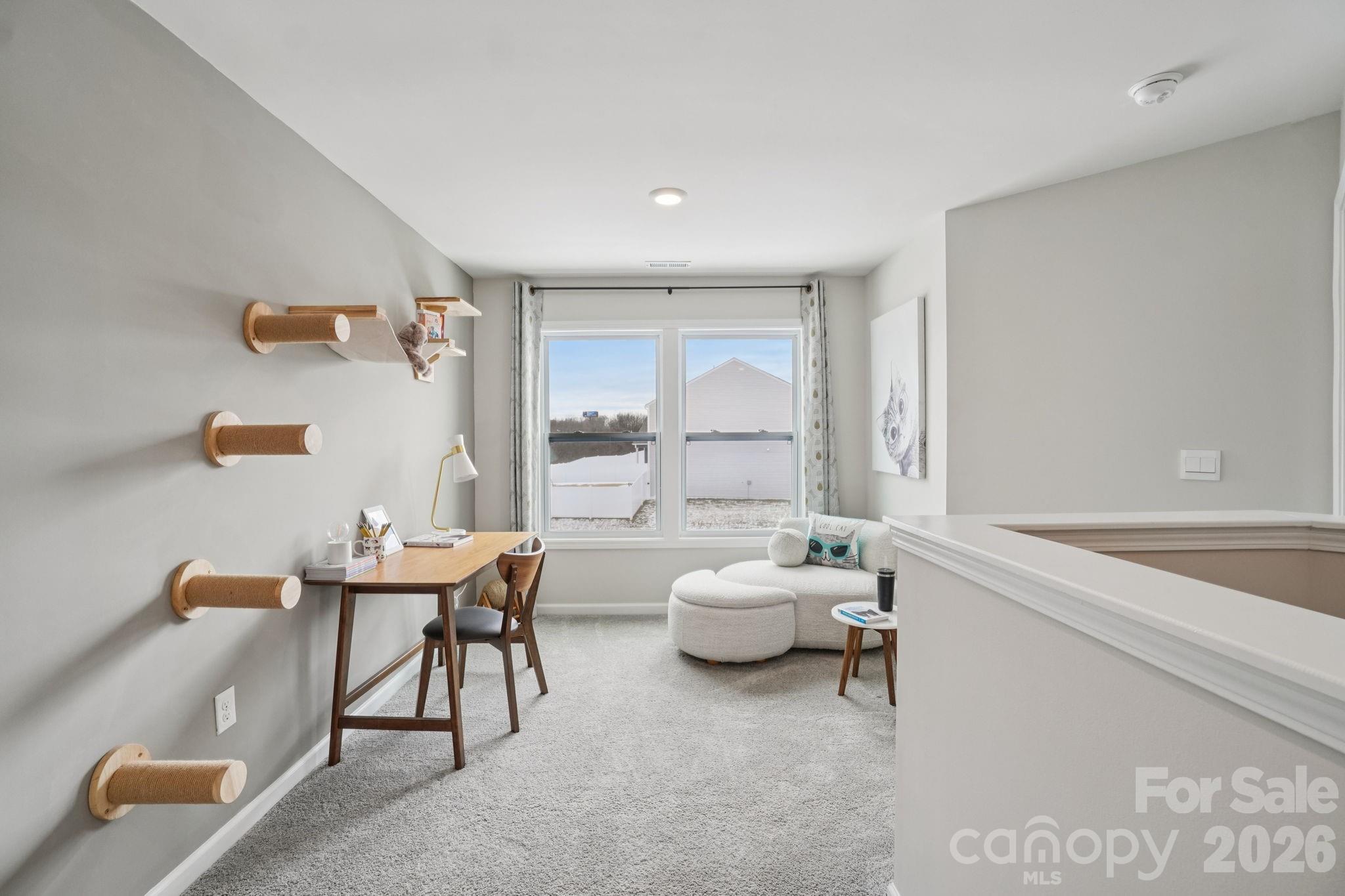 362 Lagoon Road Fletcher, NC 28732 - Photo 16 of 34 a living room with furniture and a large window