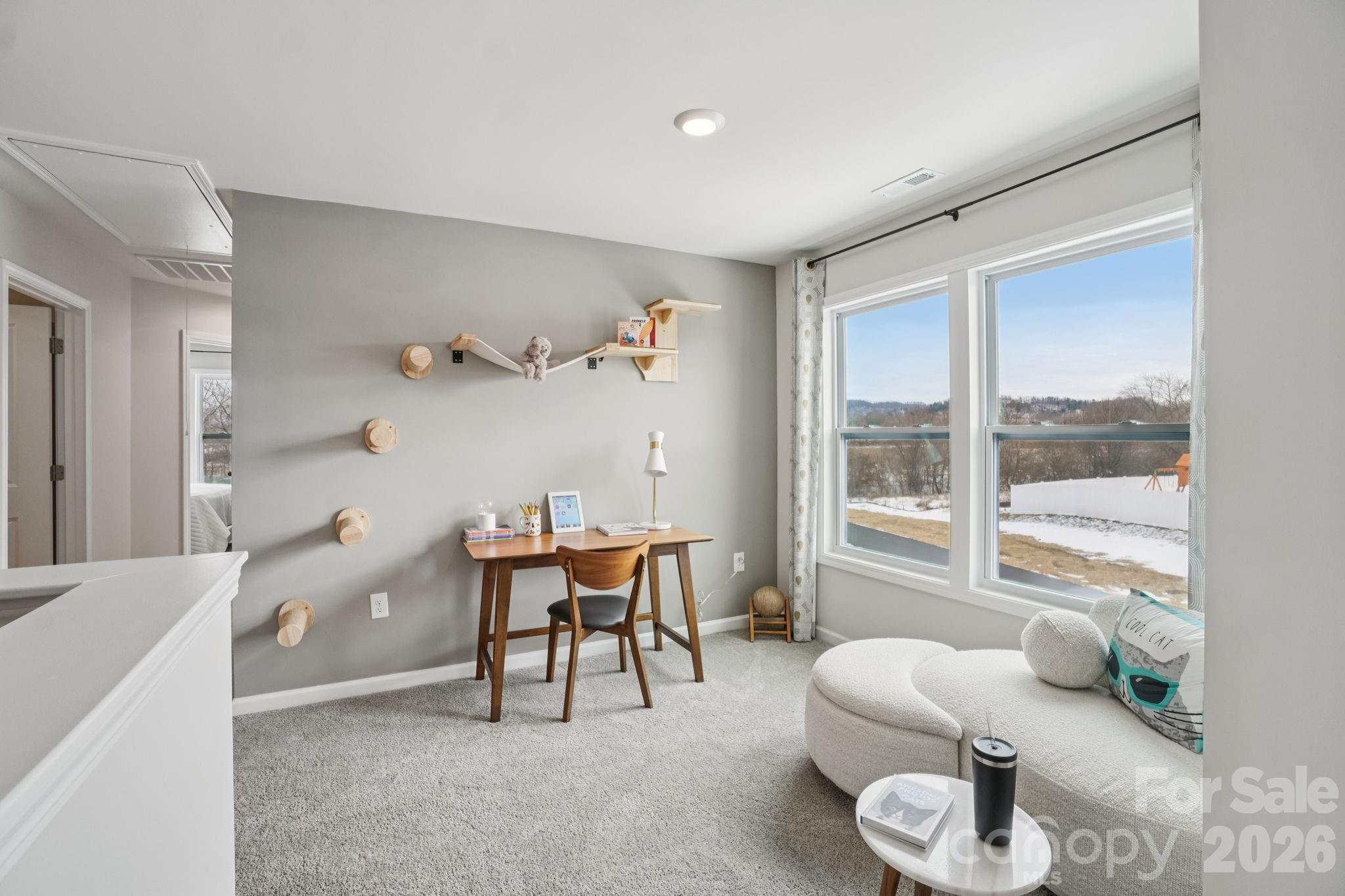 362 Lagoon Road Fletcher, NC 28732 - Photo 17 of 34 a living room with furniture and a large window