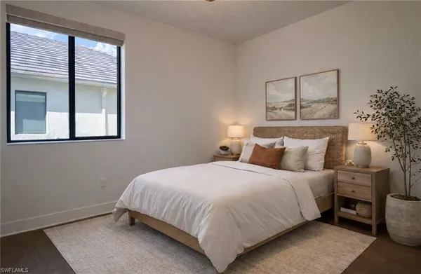 a bathroom with a sink shower and a mirror