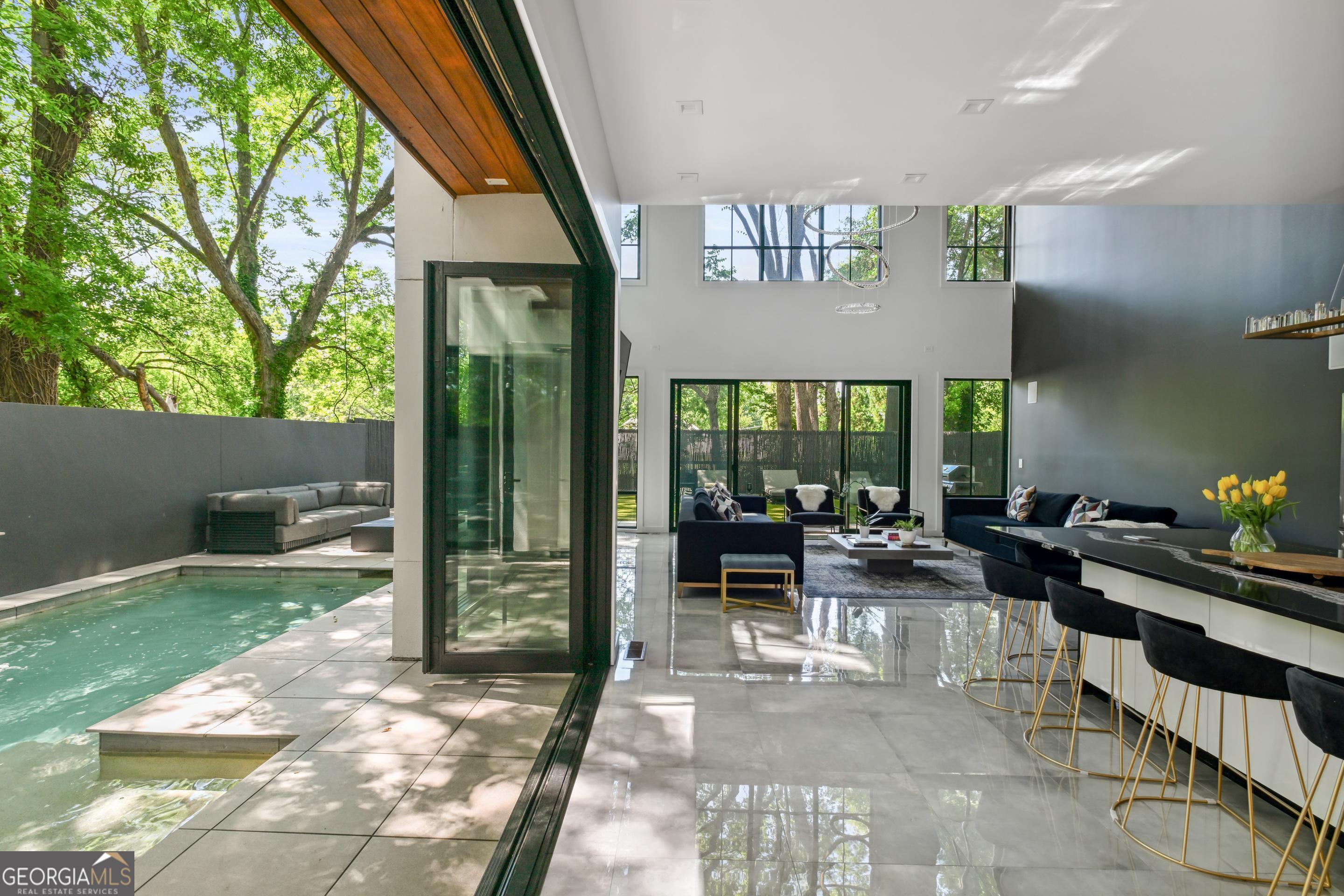 818 Verner Street Northwest Atlanta, GA 30318 - Photo 19 of 47 a lobby with furniture and floor to ceiling window