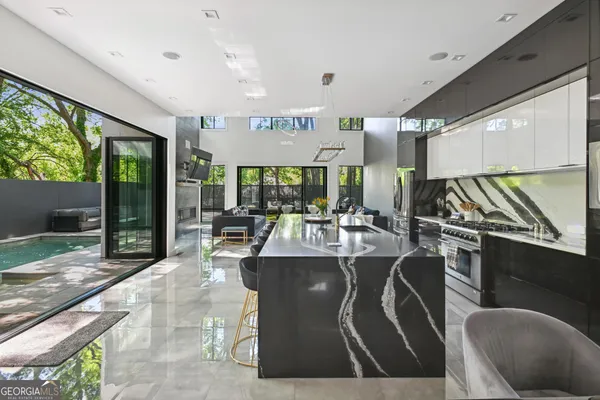 a view of a dining room with furniture window and outside view