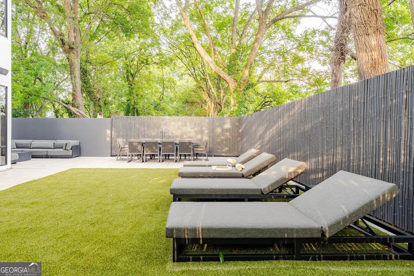 818 Verner Street Northwest Atlanta, GA 30318 - Photo 24 of 47 a view of yard and swimming pool with seating area