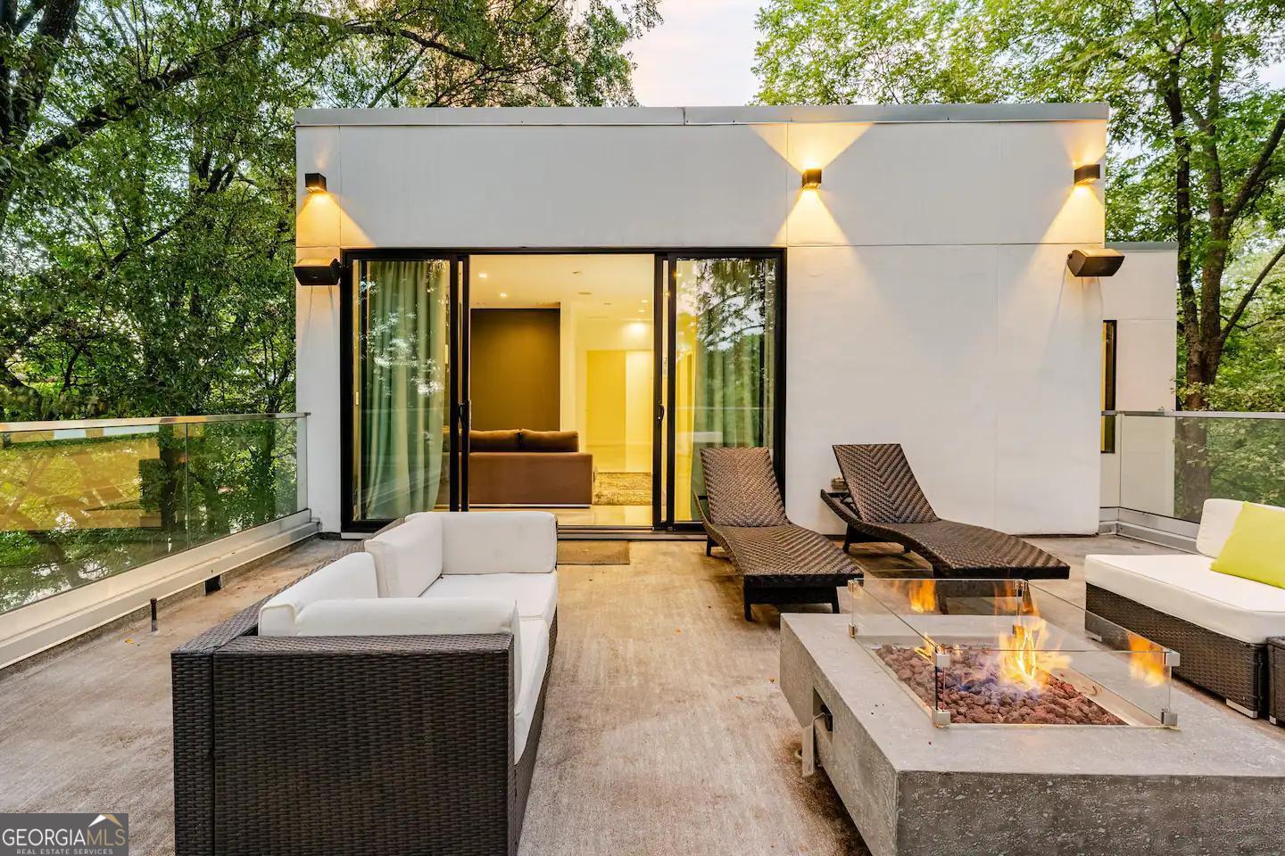 818 Verner Street Northwest Atlanta, GA 30318 - Photo 27 of 47 a outdoor space with a couch and large windows