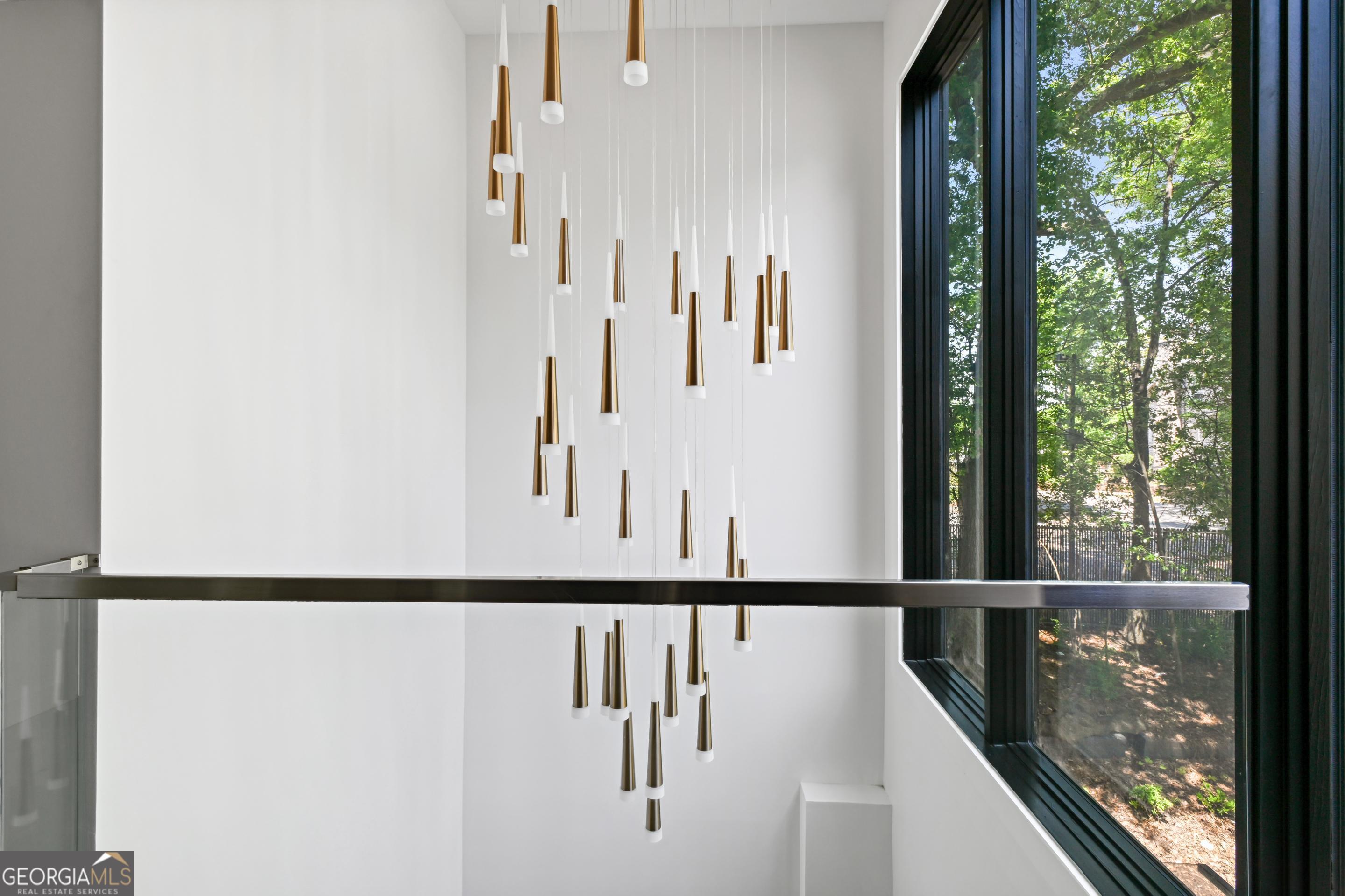 818 Verner Street Northwest Atlanta, GA 30318 - Photo 32 of 47 a view of staircase with railing and white walls