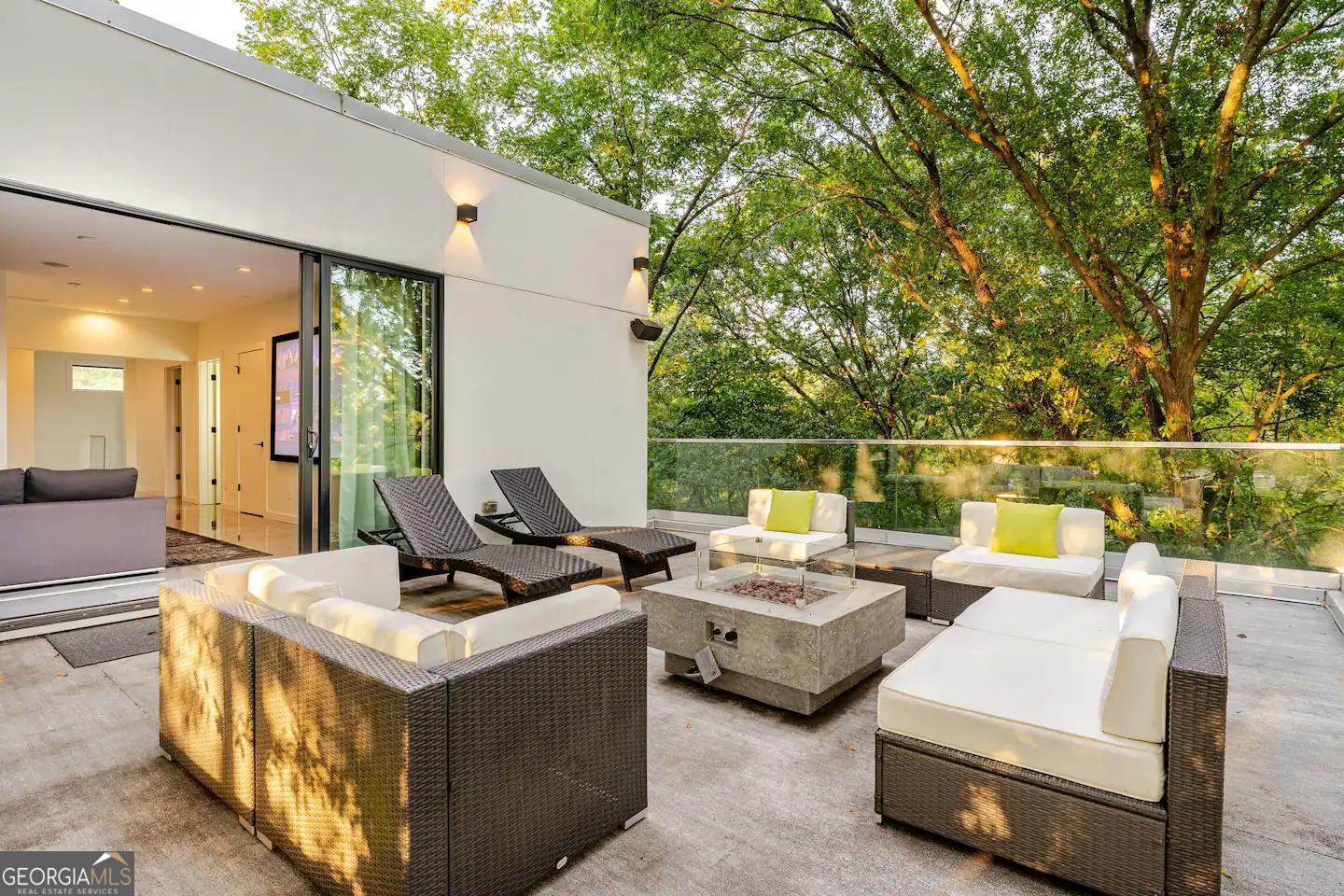 818 Verner Street Northwest Atlanta, GA 30318 - Photo 4 of 47 a living room with furniture and a fireplace