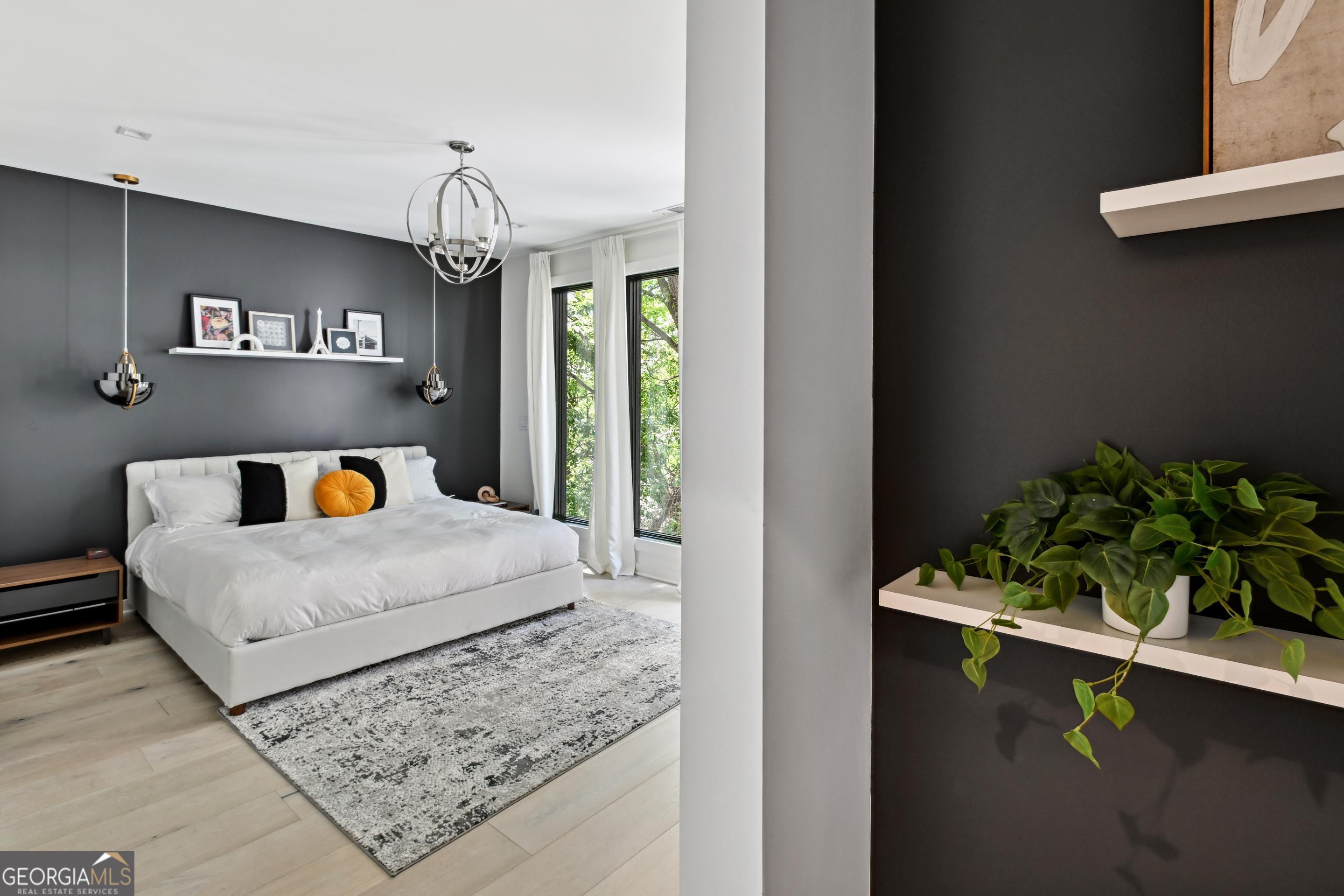 818 Verner Street Northwest Atlanta, GA 30318 - Photo 45 of 47 a bedroom with bed and window