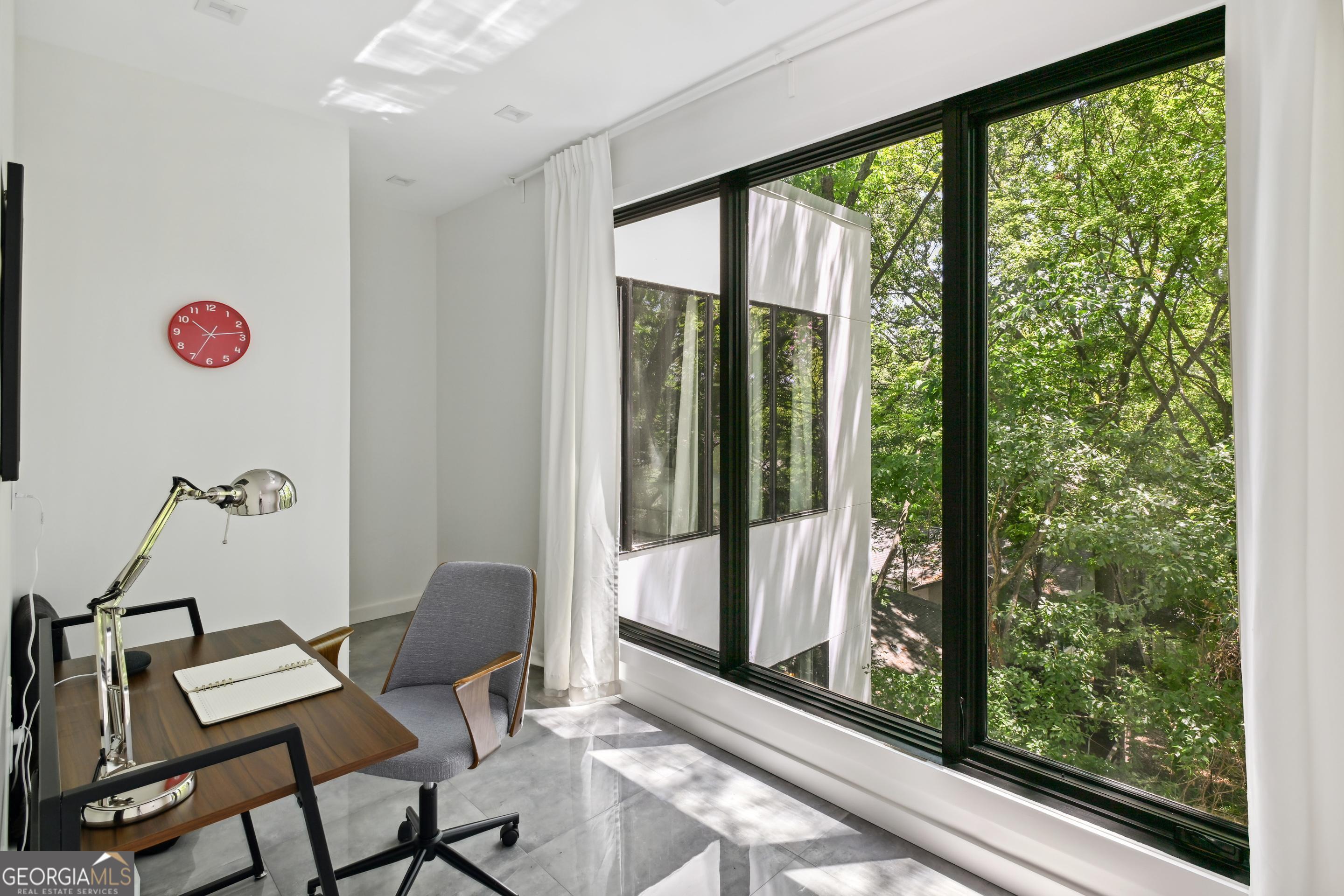 818 Verner Street Northwest Atlanta, GA 30318 - Photo 8 of 47 a view of a room with a floor to ceiling window