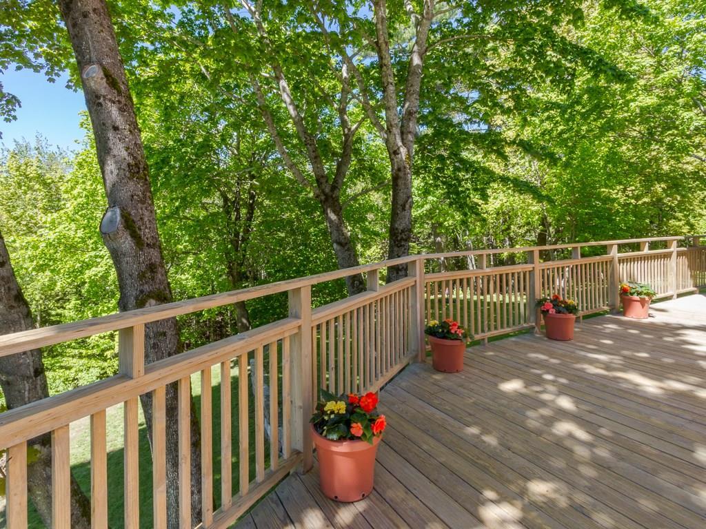 10 Jordan Pond Road Seal Harbor, ME 04675 - Photo 28 of 32 Mature trees shade the deck from the...