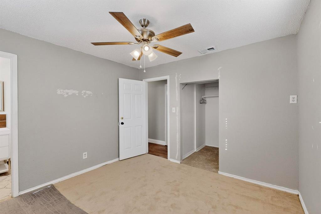 104 Maxwell Road Hackberry, TX 75036 - Photo 18 of 32 a view of an empty room