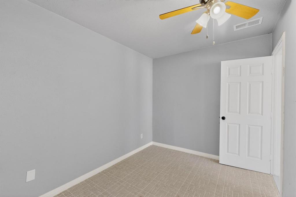 104 Maxwell Road Hackberry, TX 75036 - Photo 24 of 32 a view of an empty room