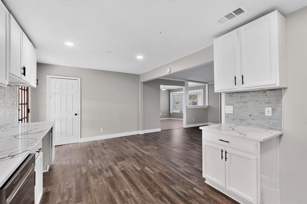 104 Maxwell Road Hackberry, TX 75036 - Photo 8 of 32 a view of a kitchen with electric appliances