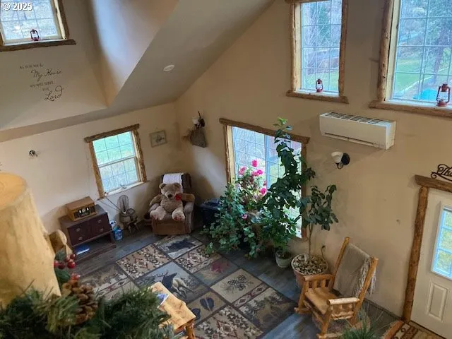 a living room with furniture and flowers