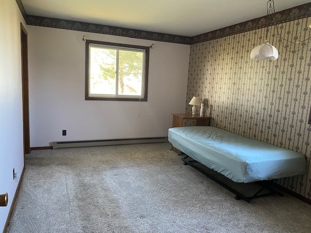 81 North 17th Road Lostant, IL 61334 - Photo 14 of 16 a bedroom with a bed and window