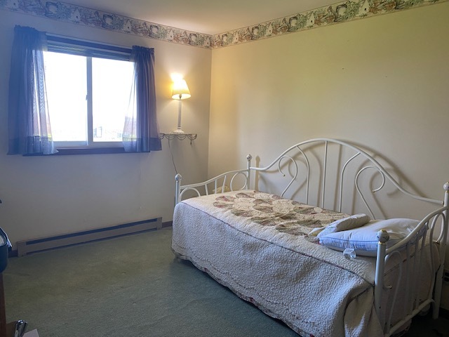 81 North 17th Road Lostant, IL 61334 - Photo 15 of 16 a bedroom with a bed and a window