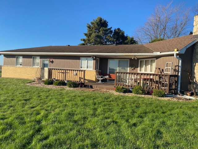 81 North 17th Road Lostant, IL 61334 - Photo 2 of 16 a view of a house with backyard and porch
