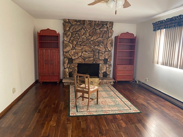 81 North 17th Road Lostant, IL 61334 - Photo 5 of 16 a living room with furniture and a fireplace