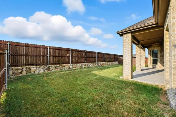 a view of a backyard with a garden