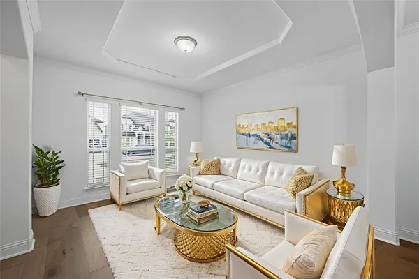 a living room with furniture and window