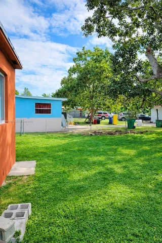 a childrens park with lots of swings and slides