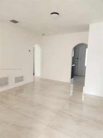 a view of a room with an empty space