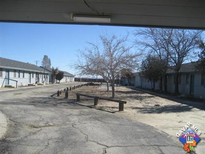12686 Claymine Road North Edwards, CA 93523 - Photo 2 of 2 a view of a backyard with wooden fence