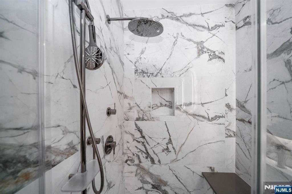 7101 River Road, Unit 304A North Bergen, NJ 07047 - Photo 13 of 24 a bathroom with a shower