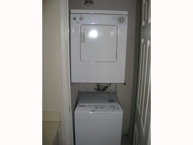 2529 Rio Grande Street, Unit 102 Austin, TX 78705 - Photo 6 of 7 a utility room with dryer and washer