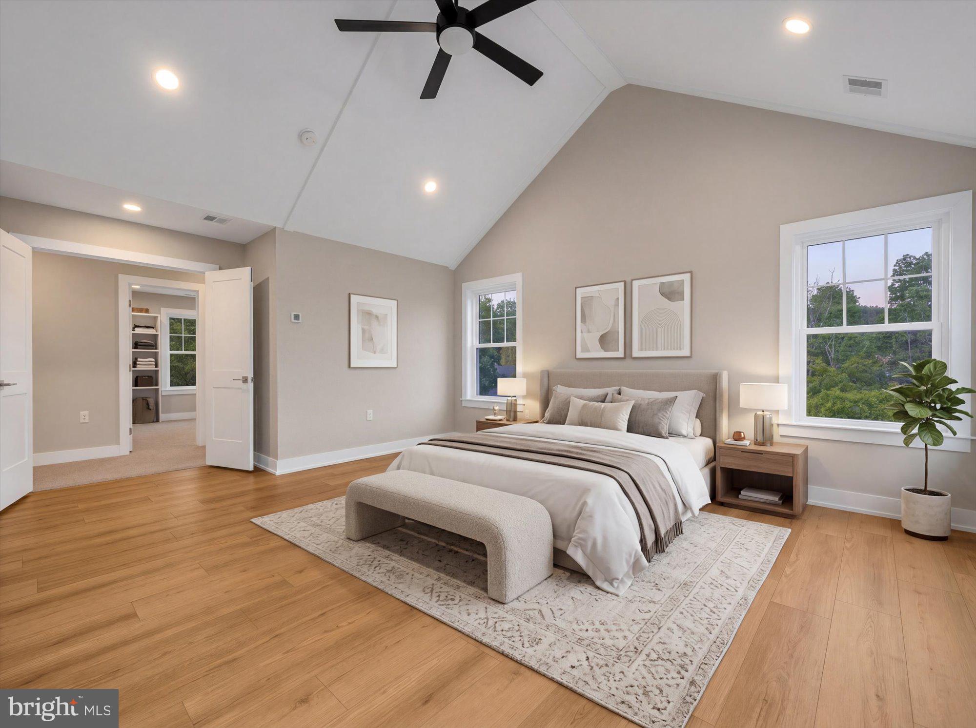 394 Renninger Road Perkiomenville, PA 18074 - Photo 6 of 41 a spacious bedroom with a large bed and a couch