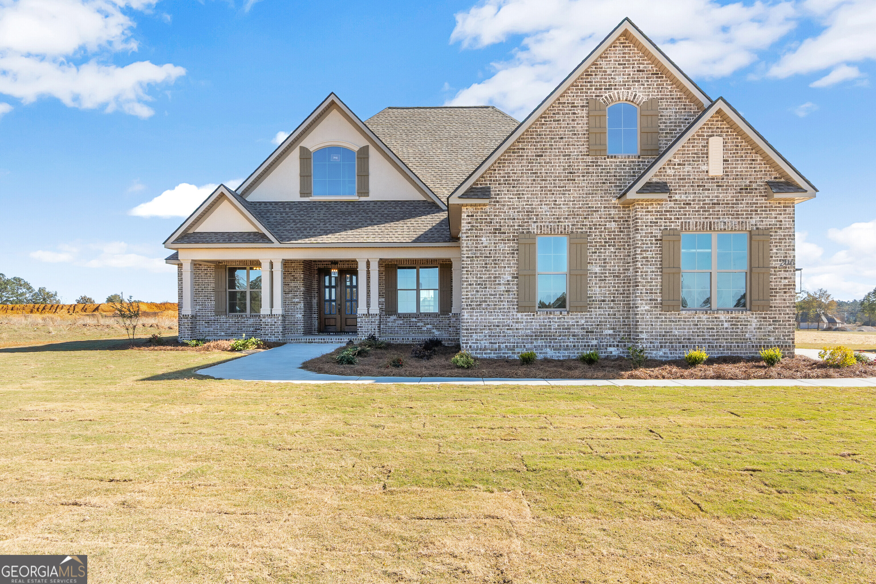206 Farrell Way Perry, GA 31069 - Photo 1 of 15 a front view of a house with swimming pool having outdoor seating