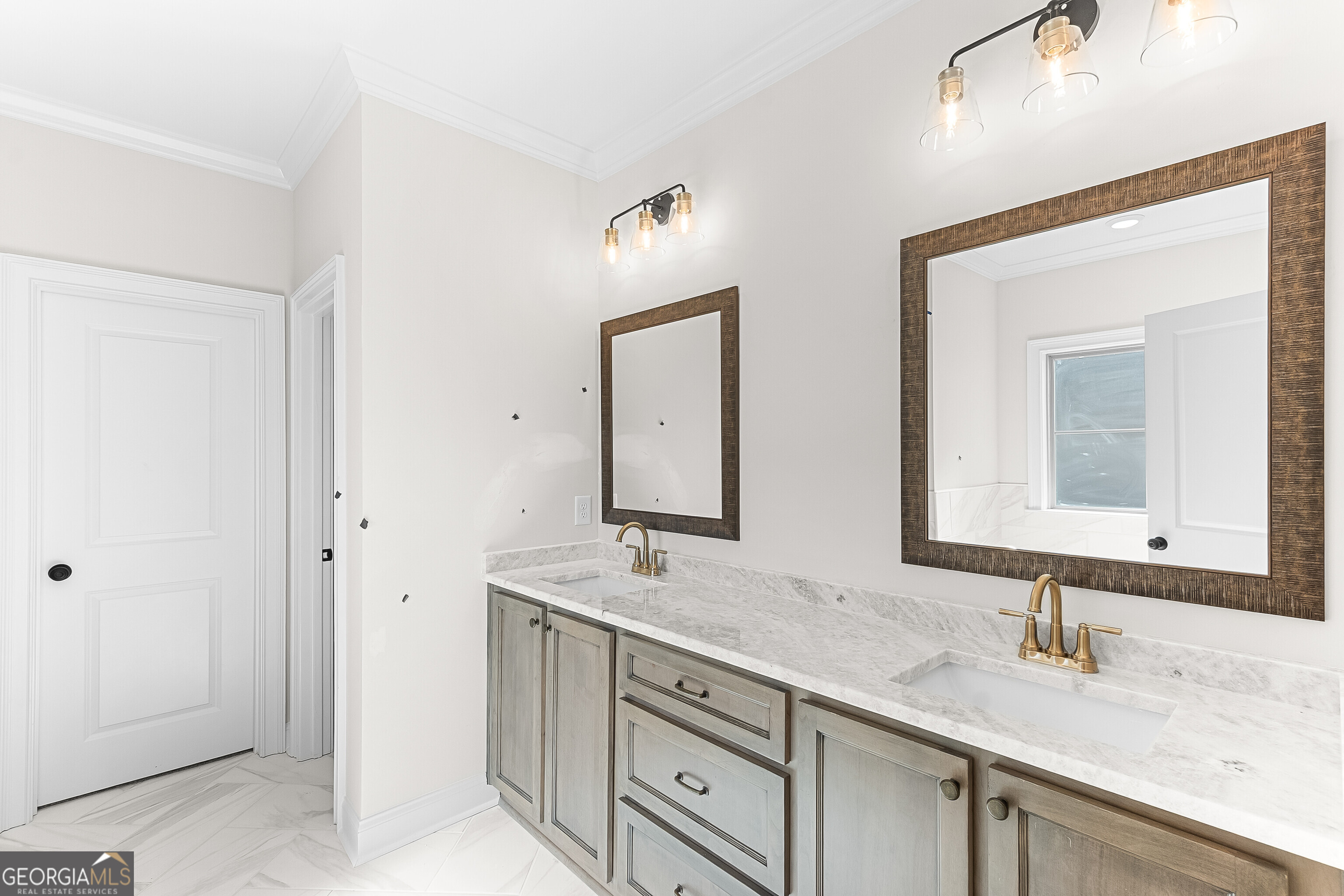 206 Farrell Way Perry, GA 31069 - Photo 11 of 15 a bathroom with double sink and a mirror