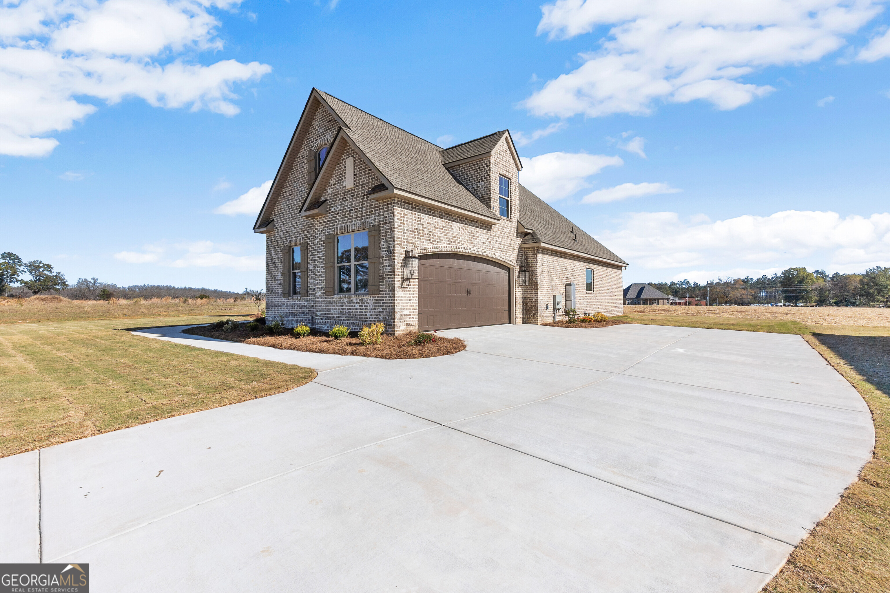 206 Farrell Way Perry, GA 31069 - Photo 4 of 15 a front view of house with yard and ocean view
