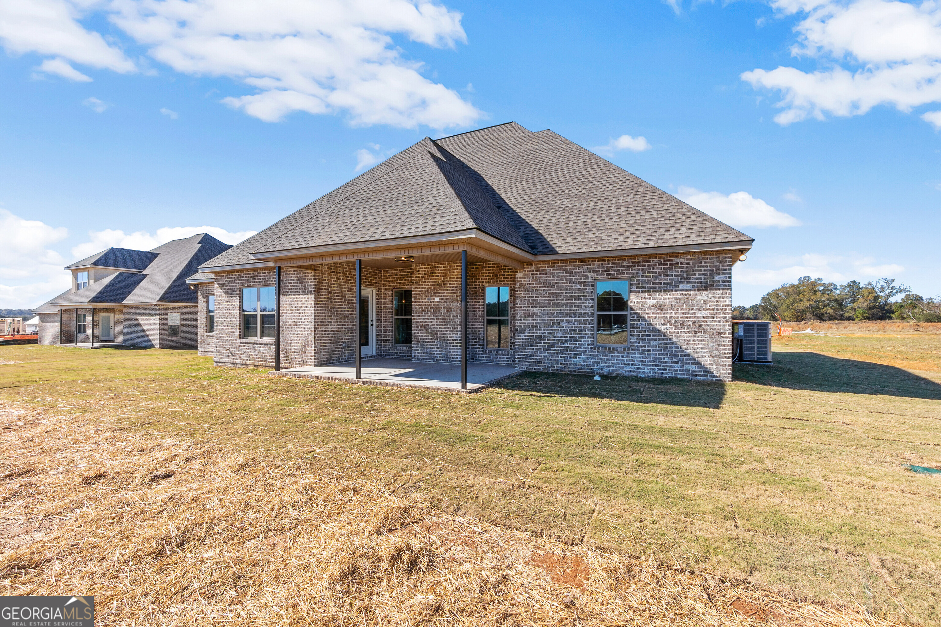 206 Farrell Way Perry, GA 31069 - Photo 5 of 15 a front view of a house with yard
