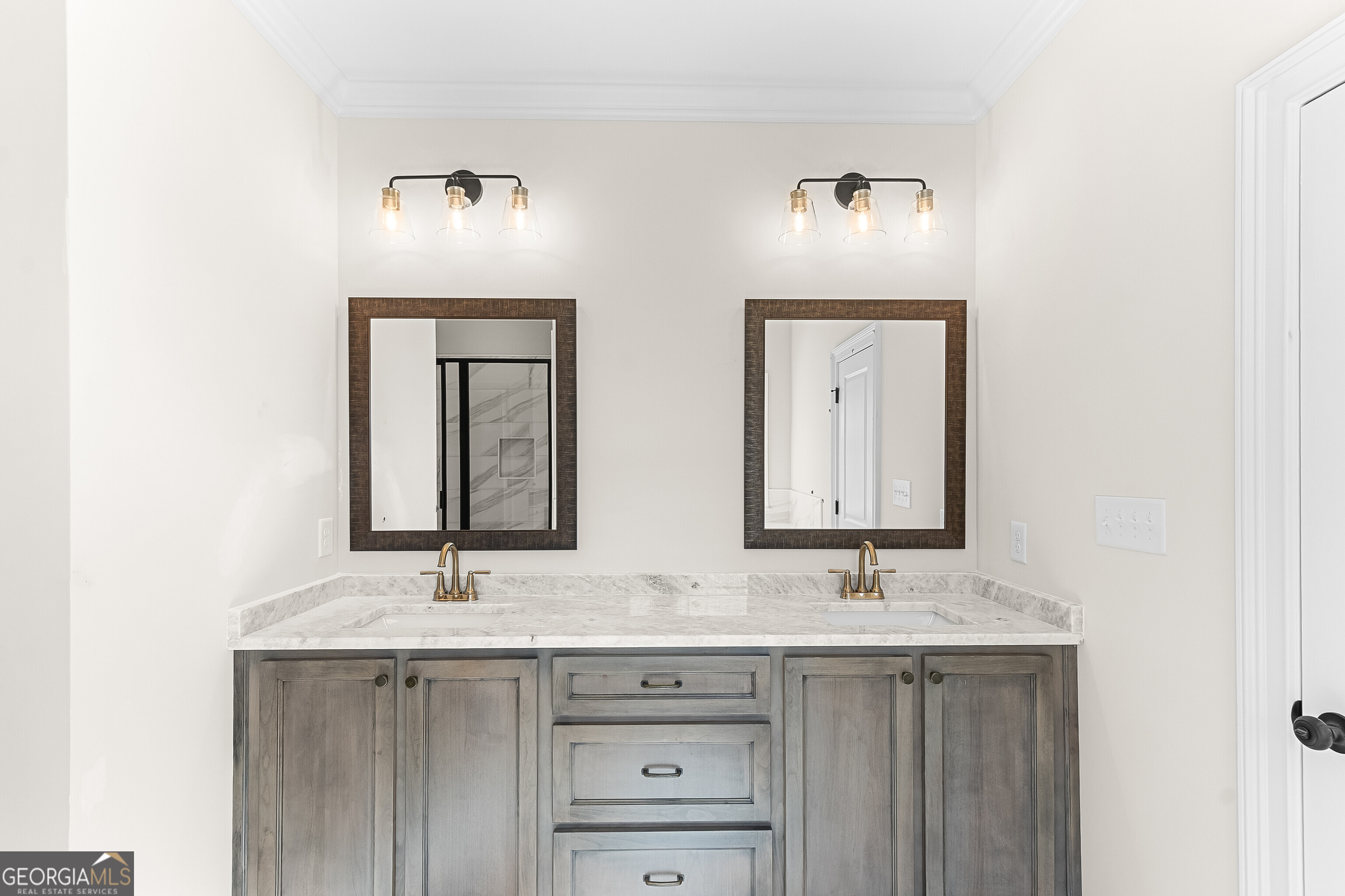 206 Farrell Way Perry, GA 31069 - Photo 10 of 15 a bathroom with double vanity sinks and a mirror