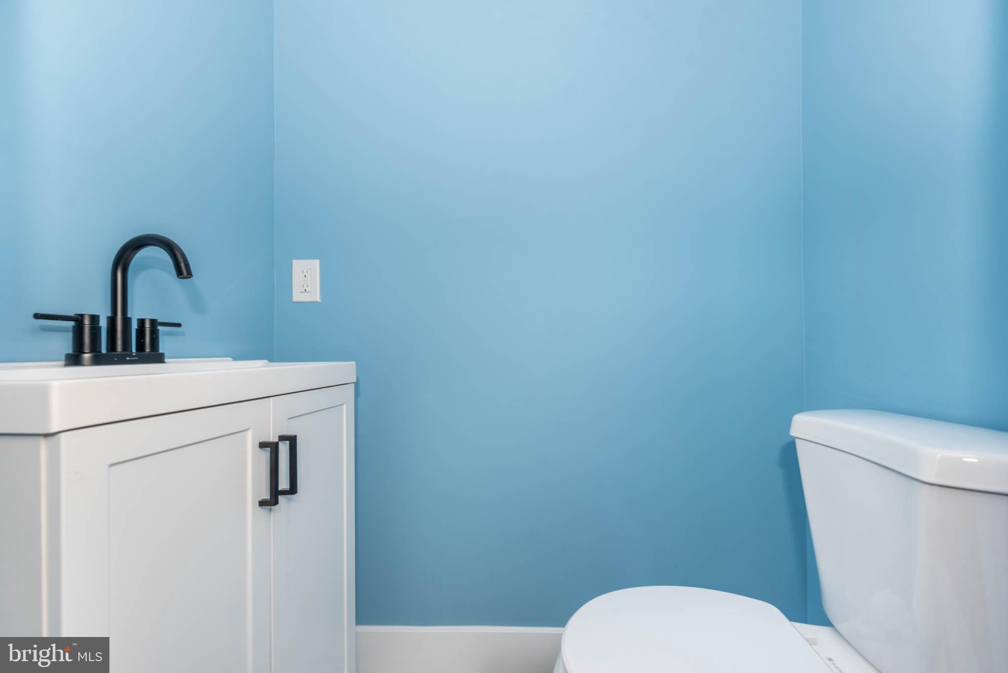 8307 Bletzer Road Baltimore, MD 21222 - Photo 13 of 37 a bathroom with a toilet sink