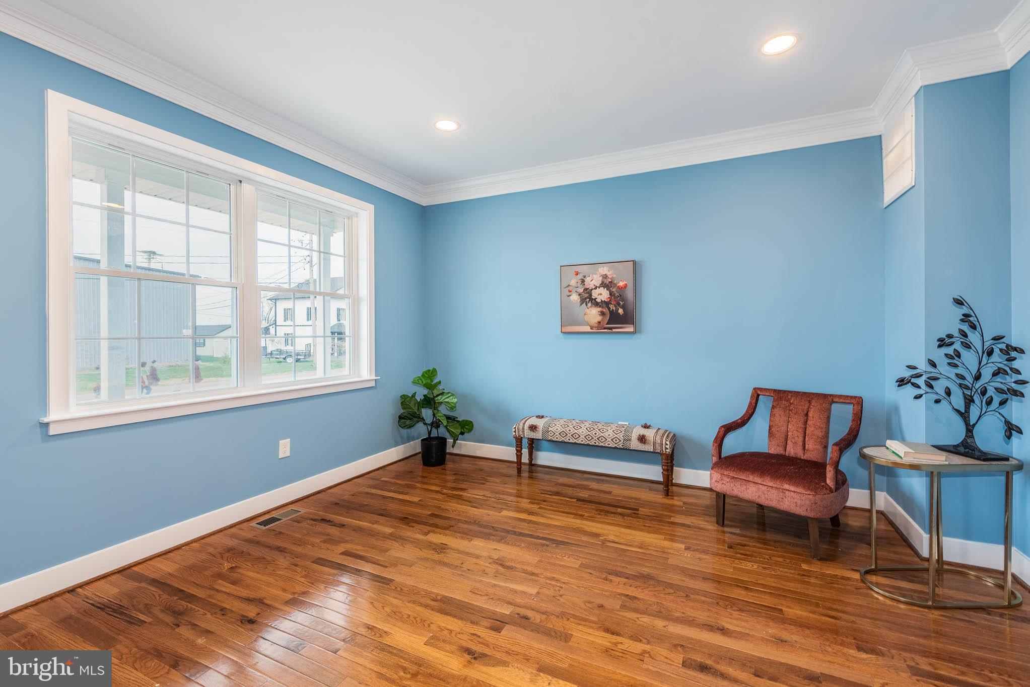 8307 Bletzer Road Baltimore, MD 21222 - Photo 2 of 37 a living room with furniture and a window