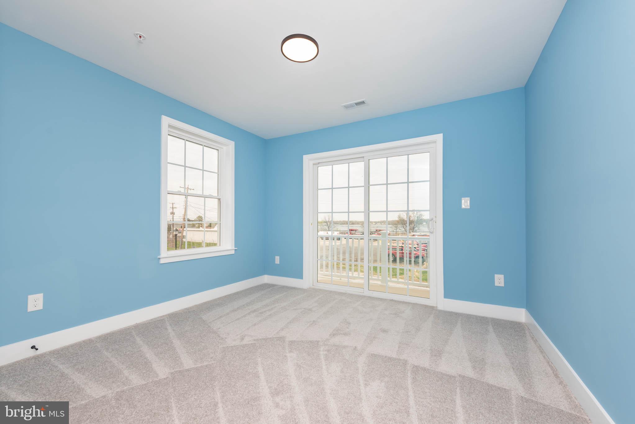 8307 Bletzer Road Baltimore, MD 21222 - Photo 27 of 37 a view of an empty room with a window