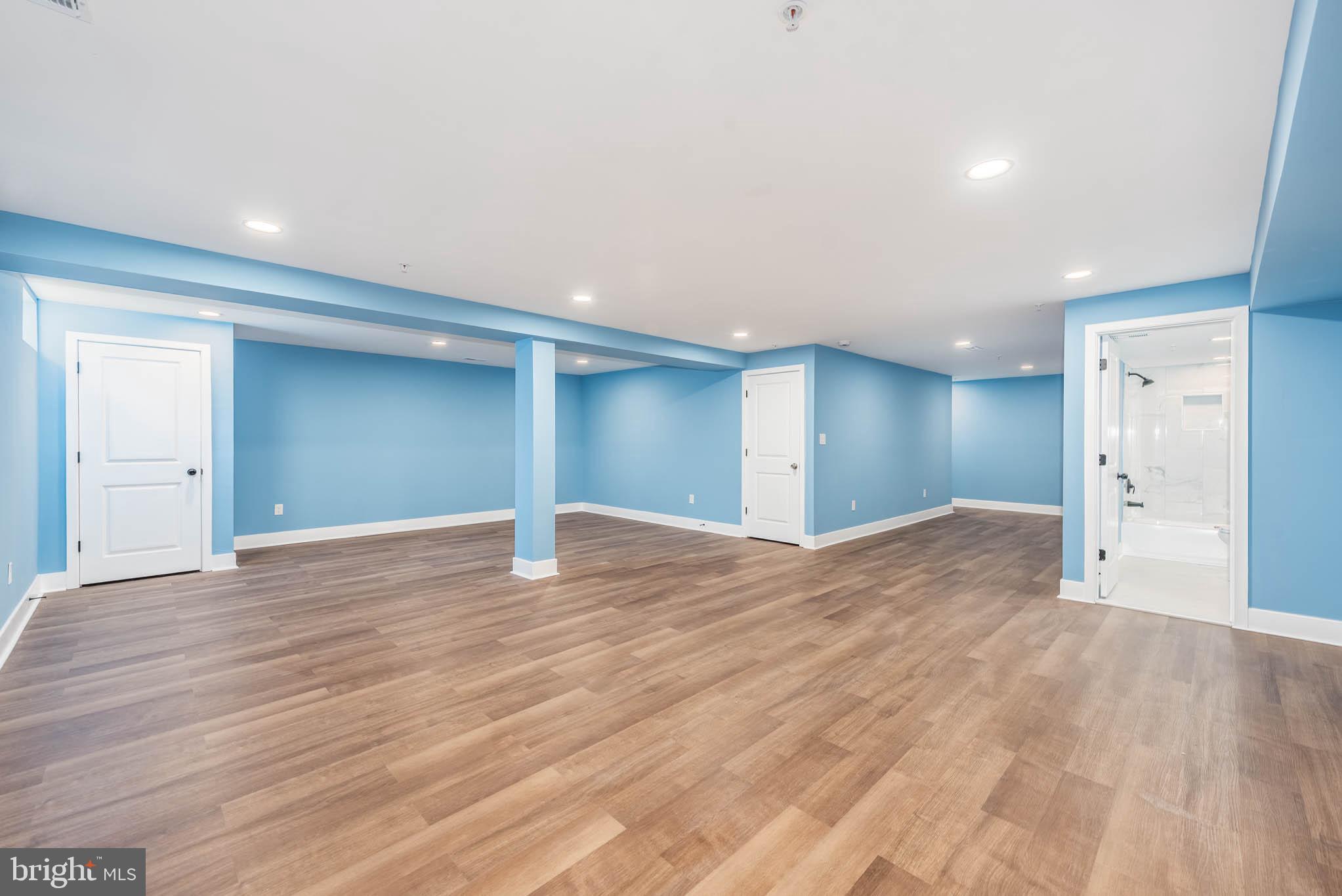 8307 Bletzer Road Baltimore, MD 21222 - Photo 31 of 37 a view of empty room with wooden floor