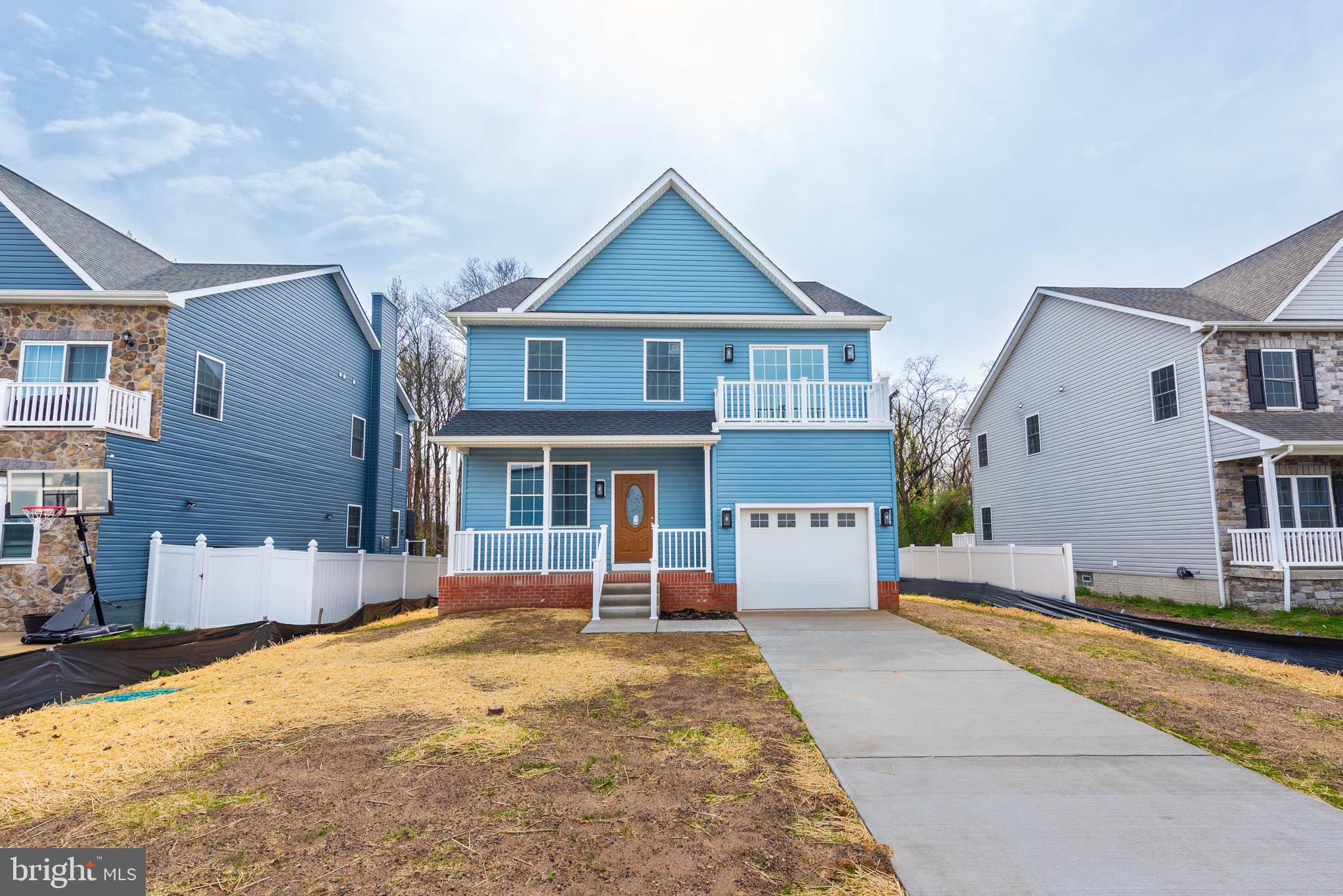 8307 Bletzer Road Baltimore, MD 21222 - Photo 36 of 37 a front view of a house with a yard
