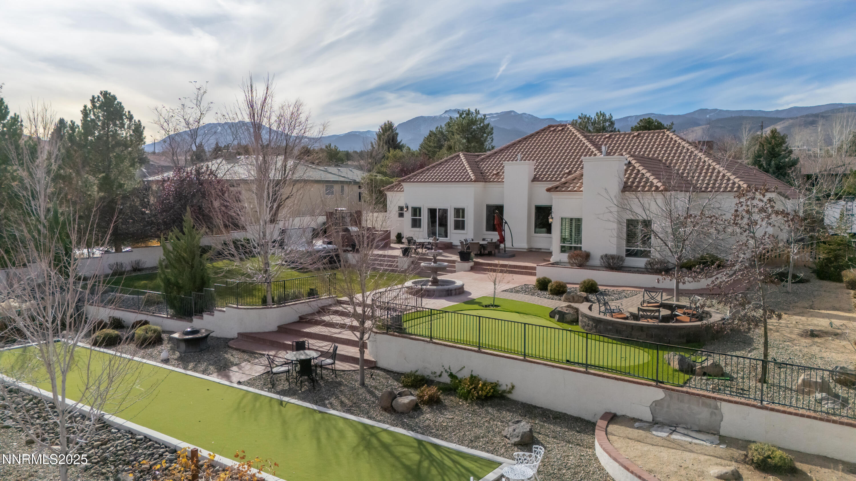 30 Calla Lily Court Reno, NV 89511 - Photo 1 of 34 a view of a house with swimming pool and a yard