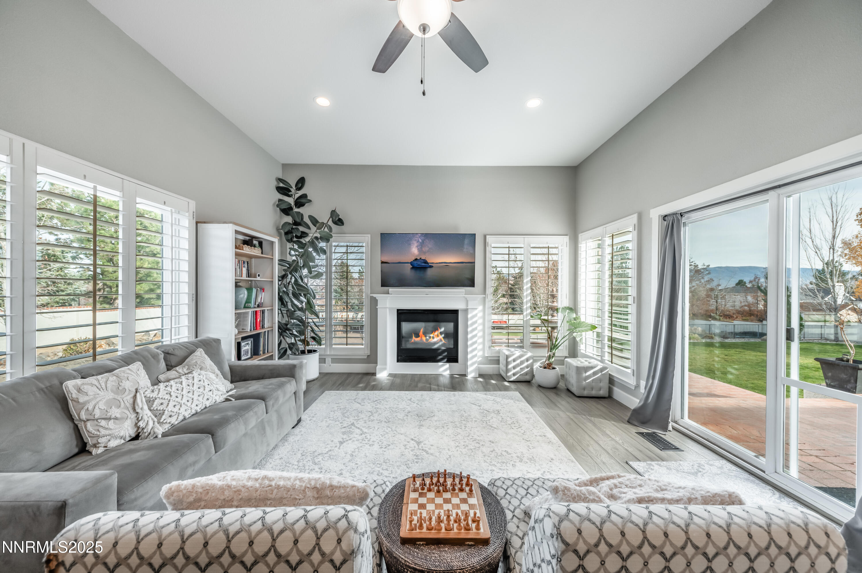 30 Calla Lily Court Reno, NV 89511 - Photo 12 of 34 a living room with furniture and a fireplace